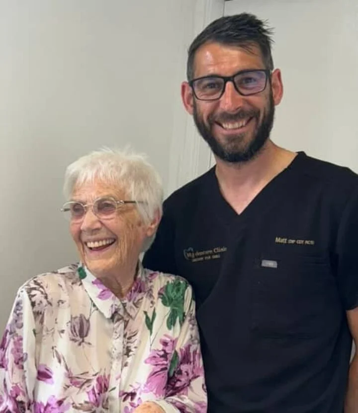 dentist with satisfied patient